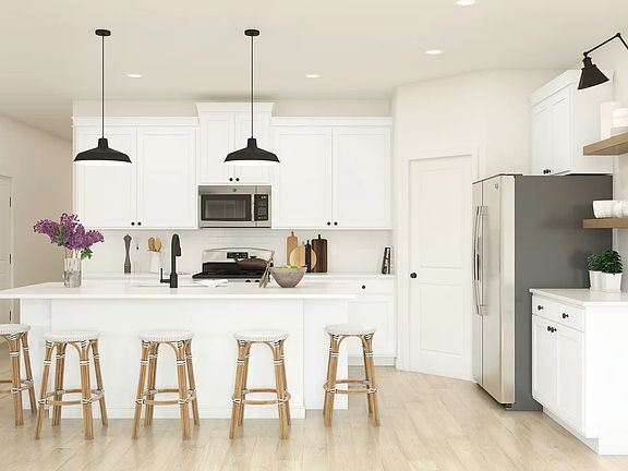 Kitchen with pendant lighting and floating shelves