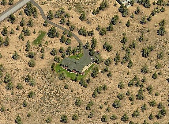 Aerial View showing private setting of this beautiful home