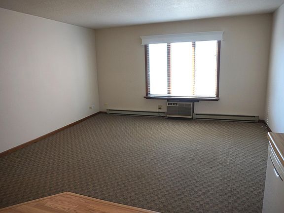 Big living room with plenty of space for couch, tv, internet ready, and has a separate air conditioner.