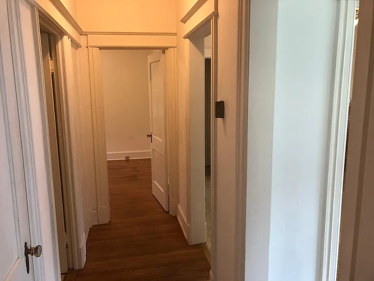 Hallway between 2 Bedrooms, Full Bath, Kitchen and Living Room