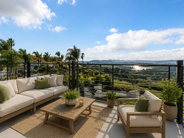 This balcony off of the Office/Bedroom overlooks Lake Jennings and faces west again for sunset views and breezes. You can see the side grass yard, the pool and endless views from here.