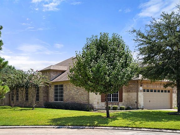 This beautiful townhome is nestled at the end of the cul-de-sac street with established shade trees and a lovely side grassy area.