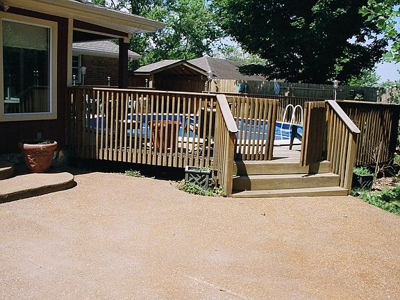 rear patio yard with full privacy fencing