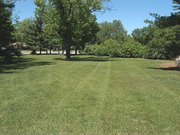Home sit on two city lots, an be subdivided. Additional garage possible