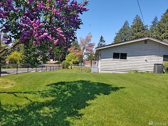 Nice sized side and front yards. Property includes 6/10 of an acre on other side of Eagle Ave