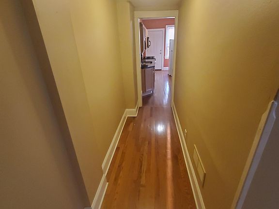Hallway connection kitchen and living room.