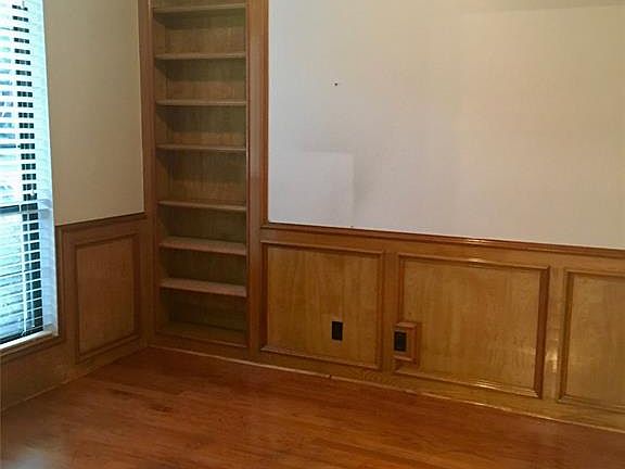 Study with French Door and a walk in closet at the left side, as you walk into the home. Hard wood floors.