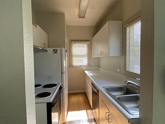 Kitchen with dishwasher and disposal