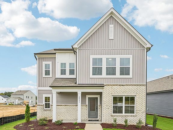 Exterior - Earthy tones and clean lines feel quietly inviting.