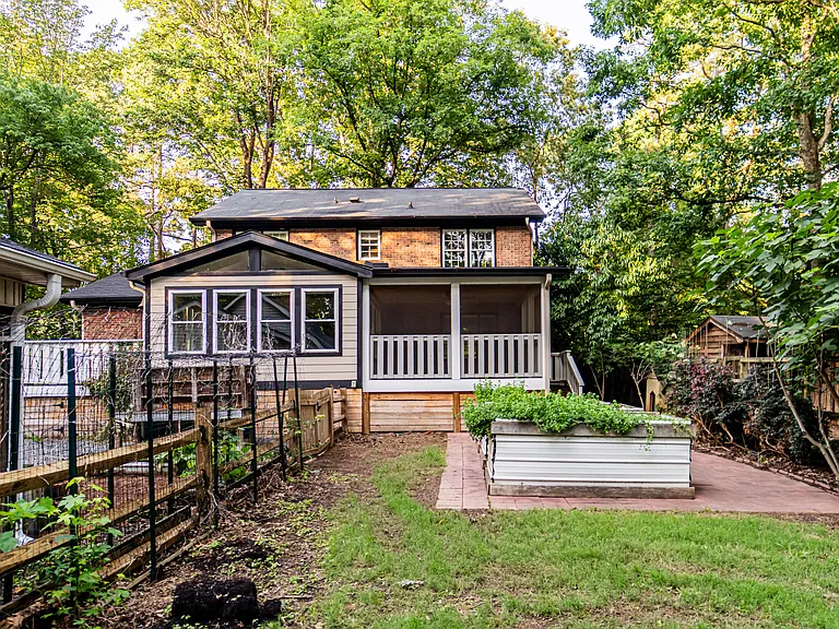 This home is a gardner's dream! There are nine garden beds, four fig trees, a persimmon tree, blackberry bushes, elderberry bushes and a chicken coop!