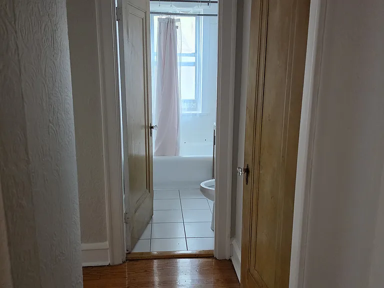 Hall outside bathroom and bedroom