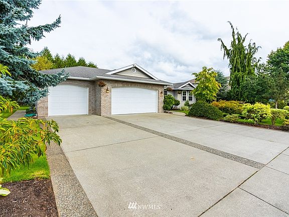 3 car garage and ample driveway parking