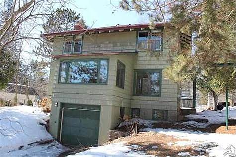 Tuckunder Garage with Sunroom above