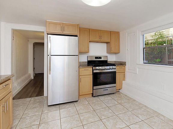 Kitchen with brand new stainless steel appliances and even more storage.