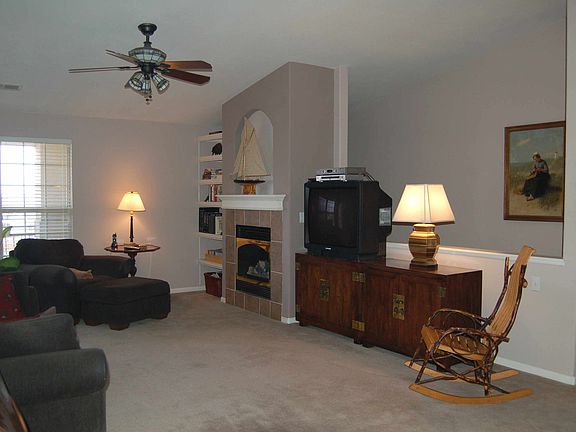 vaulted ceiling, fireplace, open plan