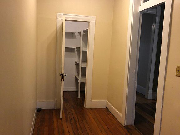 Entry foyer w/ closet opening to living room