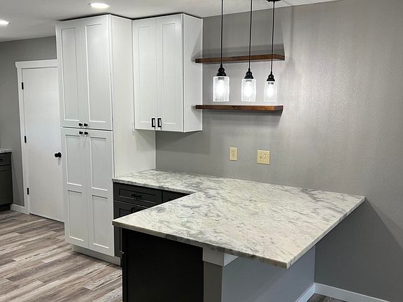 3rd image of 10240 W CHARTER OAK Drive