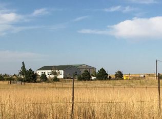 56001 E Briarwood Pl, Strasburg, CO 80136
