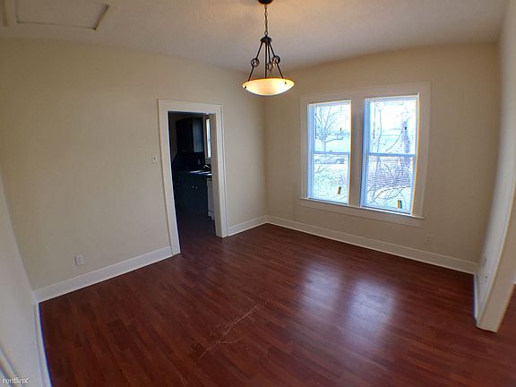 A large dining room leads from the living room into the kitc