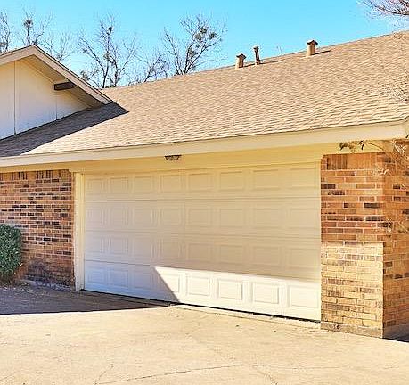 2 CAR GARAGE WITH REMOTE OPENERS!