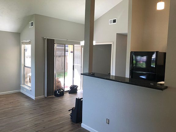 Open concept dining, living and kitchen