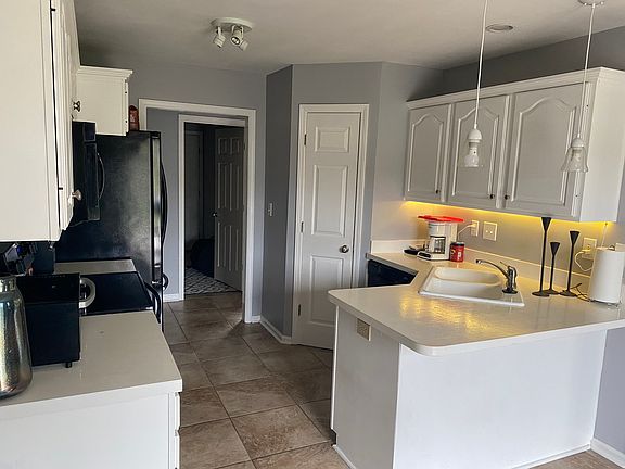 New granite countertops and new pantry added. New LVP floor. New brushed nickel flush mount kitchen fixtures and brushed nickel pendant light fixtures. All New stainless Steel GE appliances to include refrigerator, dishwasher, microwave, & electric range.
