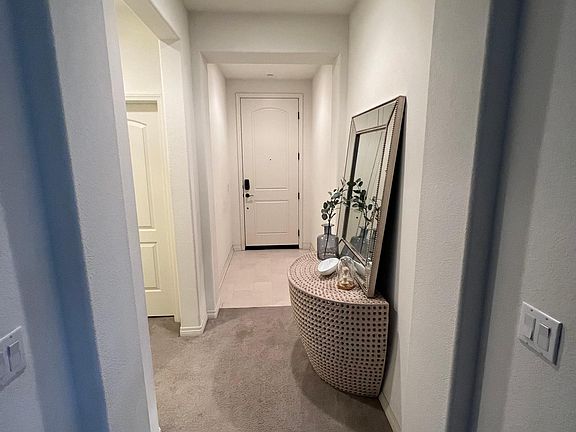 Entrance with downstairs bedroom and full bathroom.