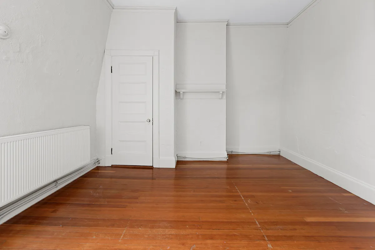 Bedroom with closet. - 49 Deering St