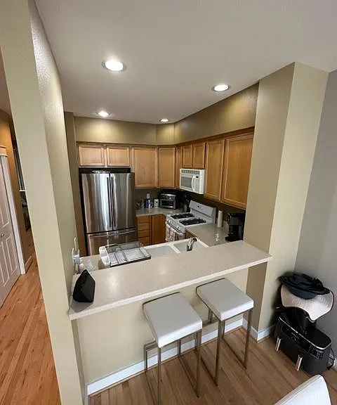 Kitchen with tall breakfast counter