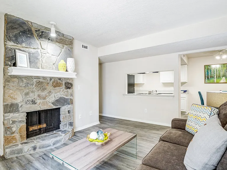 Comfort and charm come together in this living space centered around a timeless fireplace. Comfort and charm come together in this living space centered around a timeless fireplace.