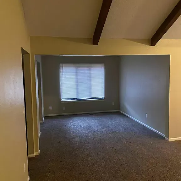 Living room/dining room with new carpet