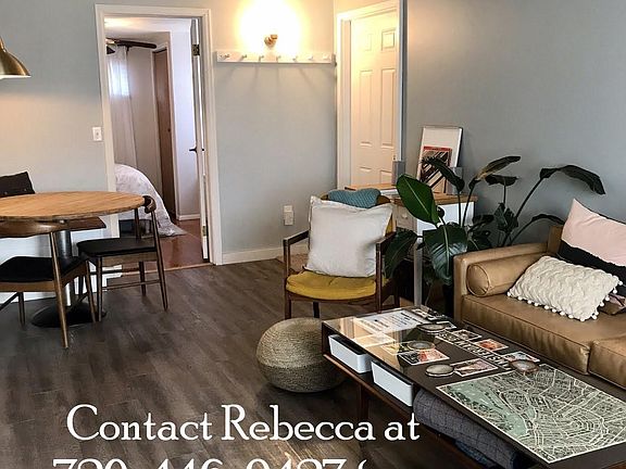 Living Room with Main Level Bathroom and Garage Access