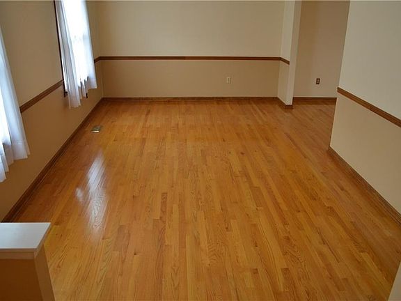 Large living room with beautiful hardwood floors