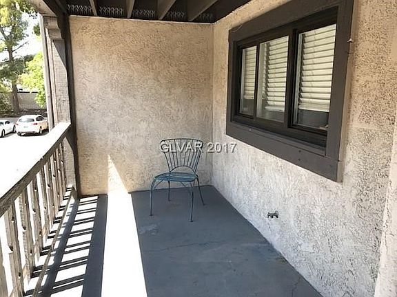 Spacious Patio Left of Front Door.  Kitchen Windows Overlook Patio.
