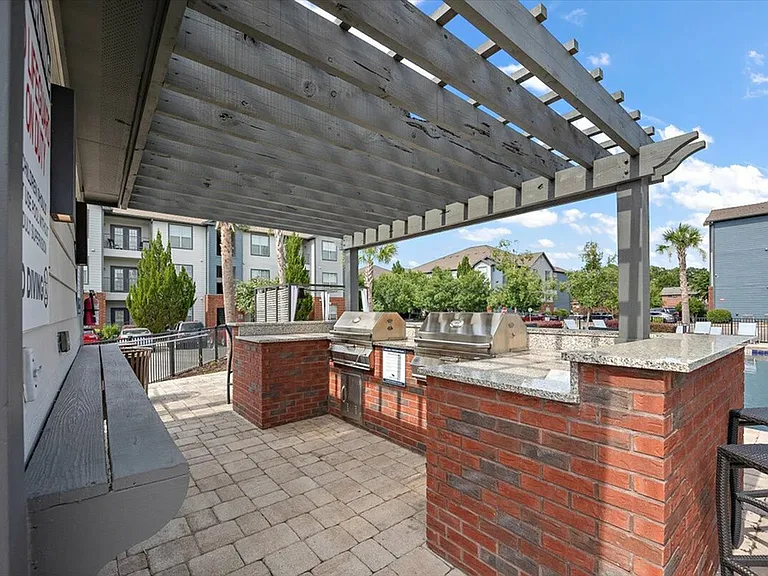 Fire Up the Grill at the Poolside Grilling Station at Eagle Flatts Apartments in Hattiesburg