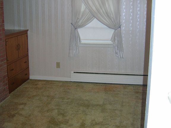 Dining Room, wood floor under carpet