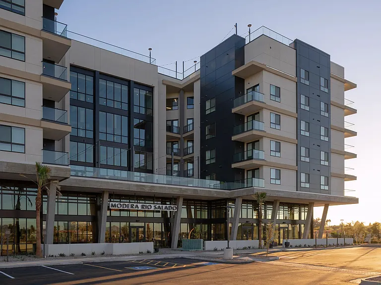 Contemporary architecture and expansive glass make a striking first impression at Modera Rio Salado, where design meets Tempe energy.