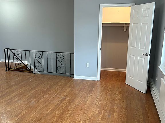 Kitchen area, living room and large closet off living room
