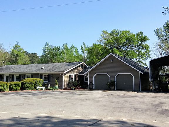 2 car garage and RV carport