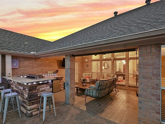 Beautiful covered patio with outdoor living space.