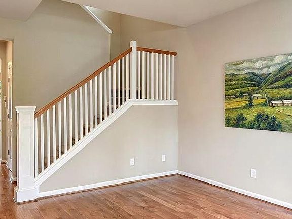 Living room / Music room / or kids playroom with hardwoord floors as you walk into your new home