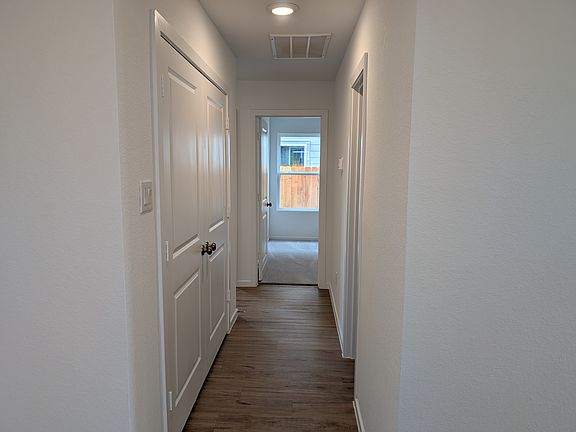Hallway to secondary bedrooms