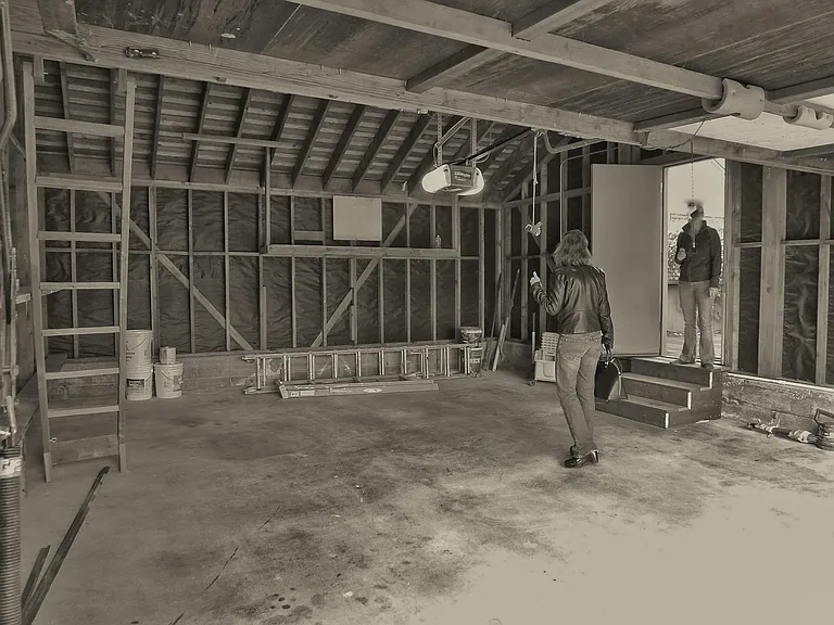 note ladder to garage storage, door to smaller deck between garage and kitchen