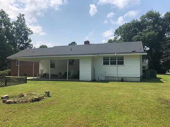 Back yard carport view