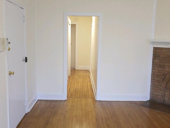 enter directly into living room. Hall leads to bedroom, bath & kitchen.