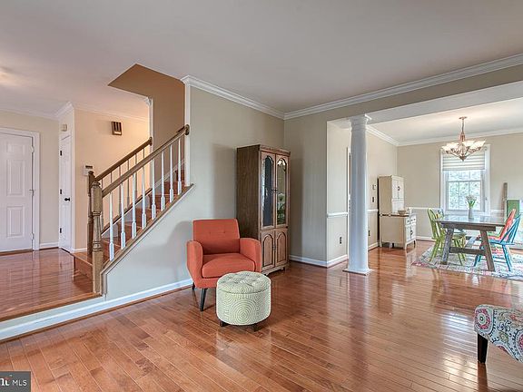 Sitting room that  leads into the dining room