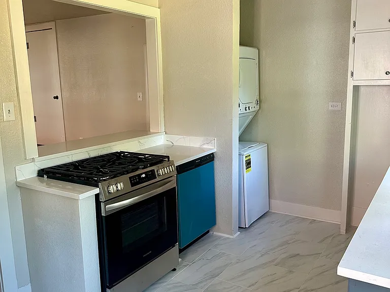 View of range and dishwasher in kitchen