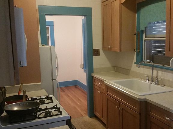 Gas stove, microwave, and refridgerator included