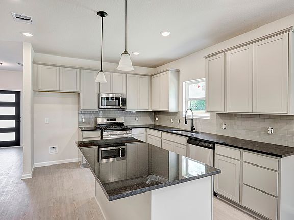 The Davenport II- Kitchen. Home under construction. Sample floor plan photo used for illustrative p