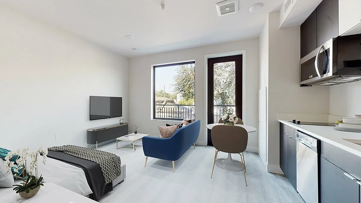 Open-Concept Studio with Natural Light and Patio Access - The Roost Apartments